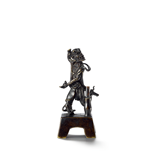 A BRONZE INCENSE STICK HOLDER